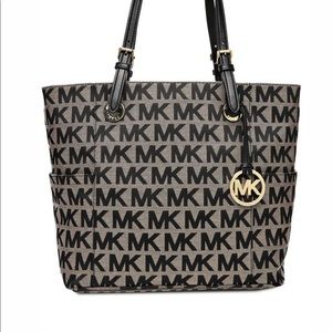SOLD Authentic Michael Kors Jet Set Monogram Logo